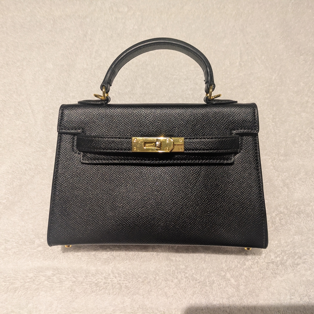 Elegant Black Handbag with Gold Accents